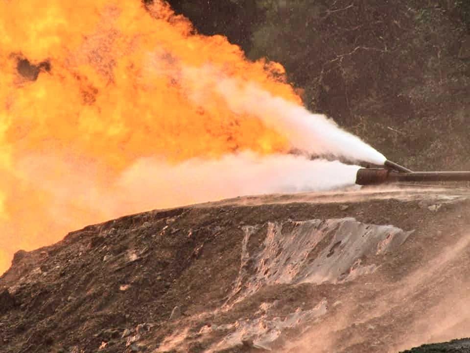 Phil_Mulacek_InterOil_Elk_Flow - Phil Mulacek Elk-1 Flow Test - Close up of gas jet. Gulf Province, Papua New Guinea